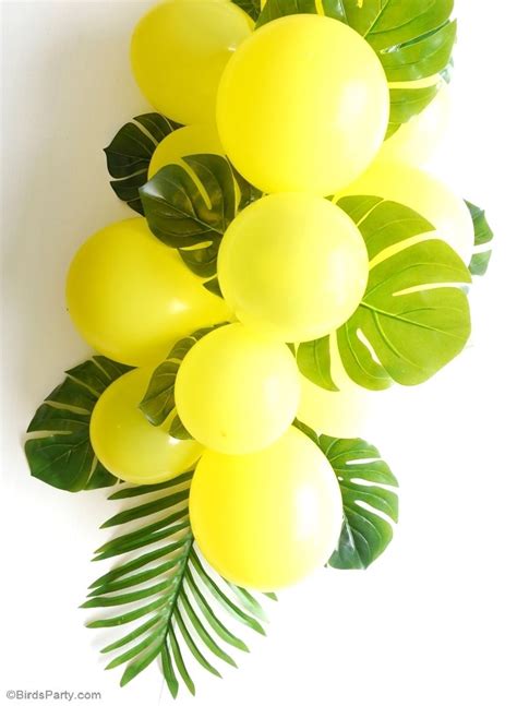DIY Balloon & Fronds Tropical Party Centerpiece | Tropical party, Balloons, Balloon diy