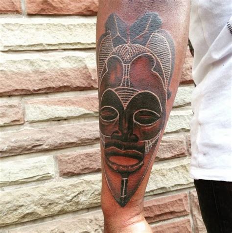 African tribal mask tattoos | Cupid tattoo, Mermaid tattoos, Elephant tattoos