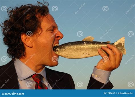 Angry Businessman Eating Fish Stock Image - Image of fish, psychiatric: 1298697