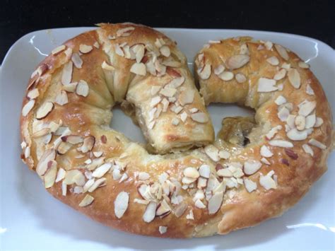 A Danish Kringle, flaky buttery pastry with a raisin filling and almond topping. | Danish food ...