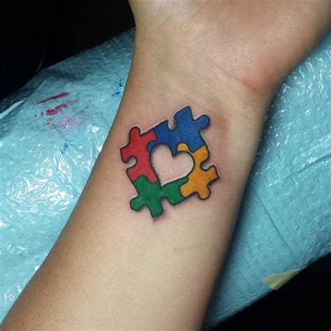 autism puzzle piece tattoo ideas