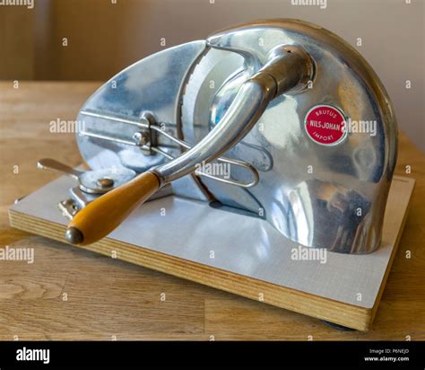 Stainless steel NilsJohan vintage hand cranked meat slicer Stock Photo - Alamy