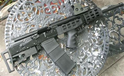 Bullpup saiga with some pointless holes for tacticool points : CursedGuns