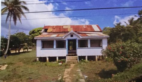 This house in Nuku'alofa, the capital of Tonga, a South Pacific Island ...