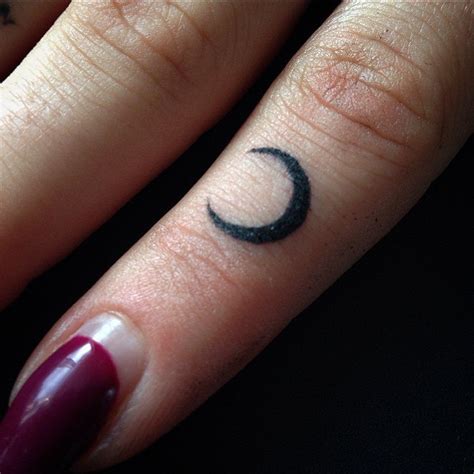 Micro crescent moon tattoo - Tattoogrid.net