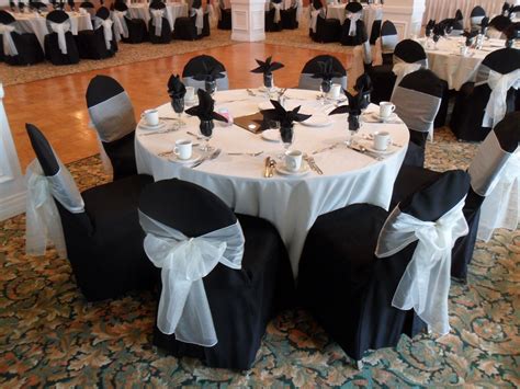 Black Chair Covers Available for rent with Ivory Bows in Long Beach - Special Event Linens ...