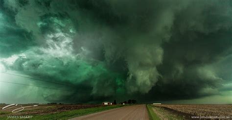 Huge supercell in Nebraska goes green last season. Tornado on the ground to the left of the ...