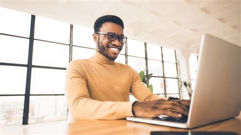 Smiling African American Guy Using Personal Computer Stock Photo - Image of discount ...