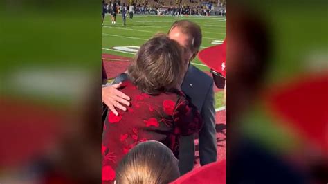 Nick Saban hugs his family before the Rose Bowl