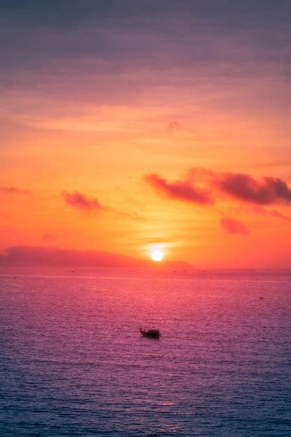 Premium Photo | Beautiful cloudscape over the sea sunrise shot lonely ...