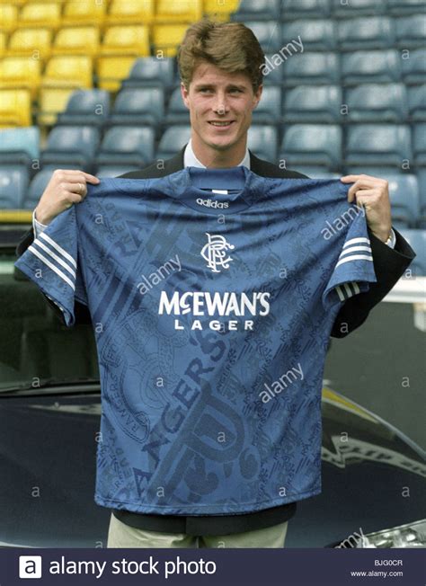 JULY 1994 IBROX - GLASGOW New Rangers signing Brian Laudrup Stock Photo ...