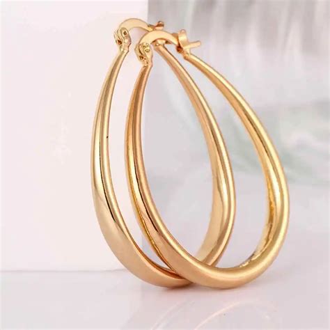 Fashion Design yellow gold/ Rose gold color medium earrings for women 4.4 x 3.4cm U shape hoop ...