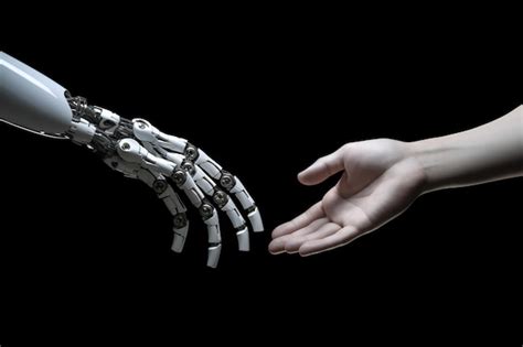 Premium Photo | A robot hand and a human hand shake each other.