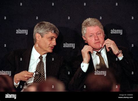 US President Bill Clinton (R) and US Treasury Secretary Robert Rubin ...