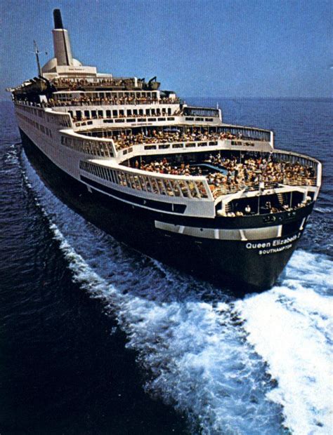 Heroic study of the iconic Queen Elizabeth 2 at sun-drenched speed, her aft decks teeming with ...