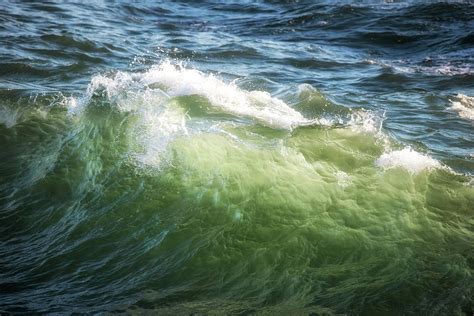 Beautiful crest of ocean wave crashing at sunset with backlighti Photograph by Matthew Gibson ...