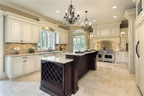 Elegant kitchen with white kitchen cabinets and espresso island Quartz countertops tile ...