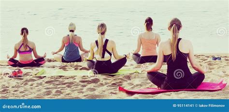 Group of Females Performing Yoga on Beach Stock Image - Image of position, fitness: 95114141