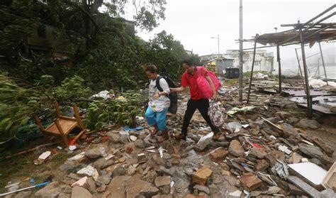 Flooded homes, shattered windows, a submerged car park and deadly bamboo ... Hato’s wrath in ...