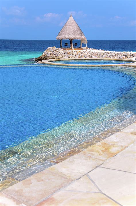 Blue Infinity Pool. Maldives 1 Photograph by Jenny Rainbow - Fine Art ...