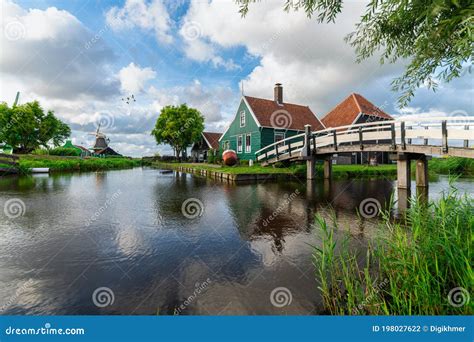 Geese Flying Over Zaanse Schans Cheese Factory Reflection Stock Photo ...