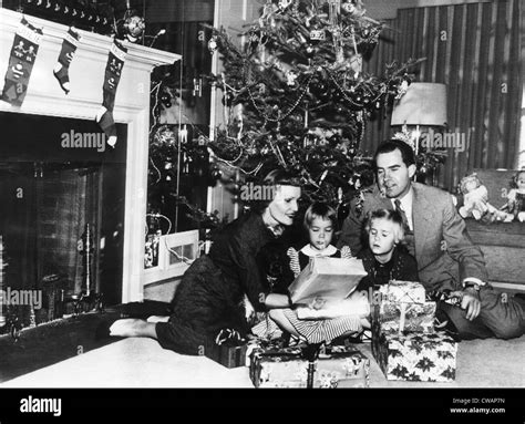 The Nixon family on Christmas Eve: Pat Nixon, Julie Nixon, Tricia Nixon, and Vice President ...