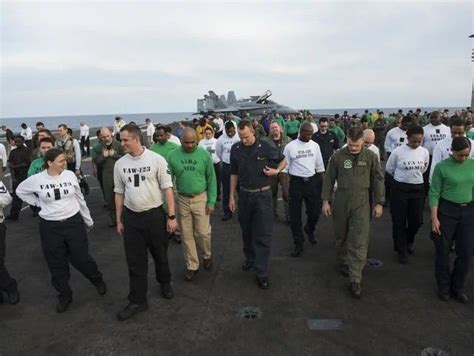 USS Eisenhower crew members walk the length of the flight deck. JACK GRUBER, USA TODAY | Crew ...