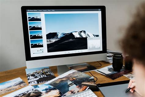 Photographer working in the office | Premium PSD Mockup - rawpixel