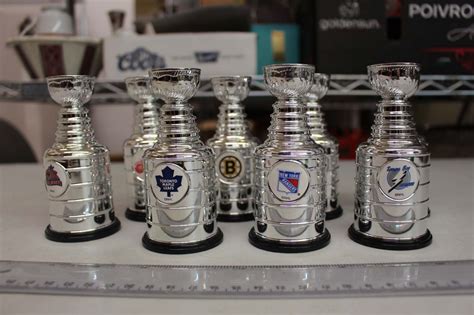 Lot of Mini Replica Stanley Cups (8)