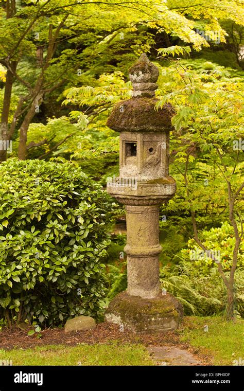 Stone monument in Japanese garden Stock Photo - Alamy