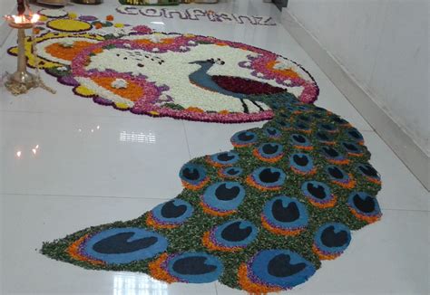 peacock flower rangoli athapoo pookkalam design onam kerala | Pookalam design, Rangoli designs ...