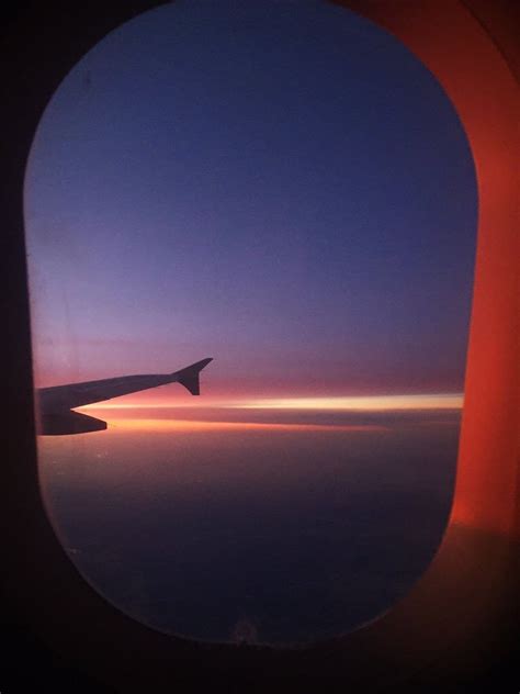 A sunset on a plane! | Travel aesthetic, Airplane view, Airplane photography