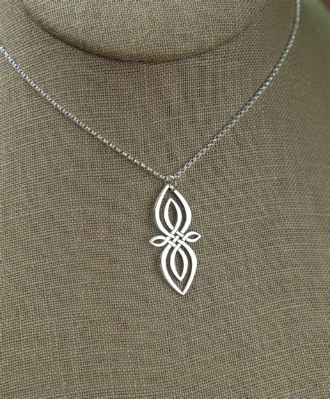 Celtic knot infinity pendant necklace in sterling silver