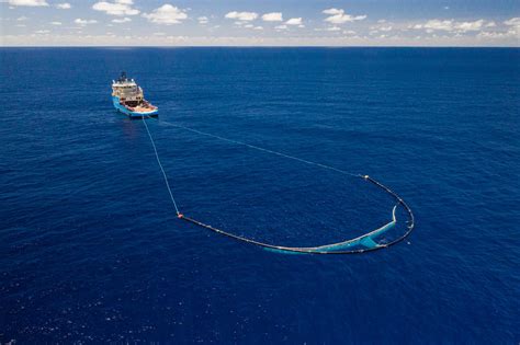 Ocean Cleanup attaches parachutes to trash-collecting barriers to ...