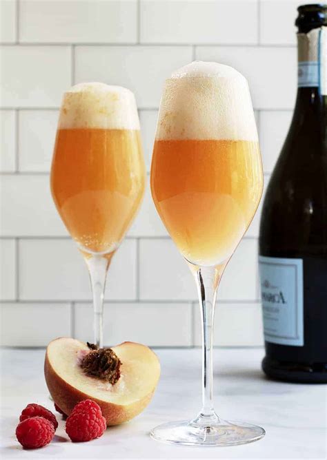 The BEST Peach Bellini Recipe - Pinch and Swirl