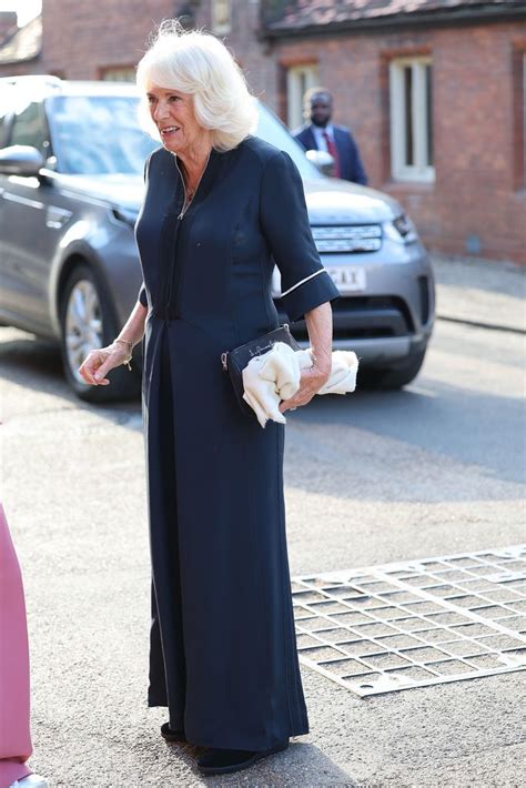 Queen Camilla, 76, steps out with divisive slogan accessory at Hampton ...