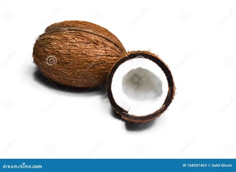 Coconut with cut half. stock image. Image of ingredient - 168587463