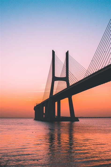 silhouette of bridge under clear sky photo – Free Bridge Image on Unsplash