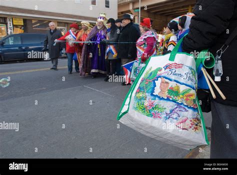 Paraders prepare to march in the annual Three Kings Day Parade in the ...