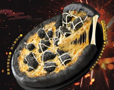 Pizza Hut Taiwan's New Halloween Pizza Looks Like a Charred Black Pizza Topped with Lumps of Coal