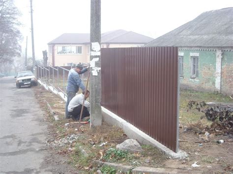 Corrugated Metal Fence Installation in 2020 | Corrugated metal fence, Fence design, Metal fence