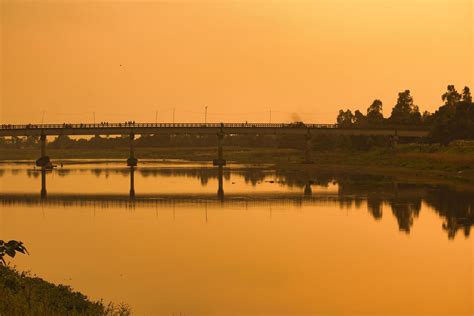 Sunset with Bridge. 8422473 Stock Photo at Vecteezy