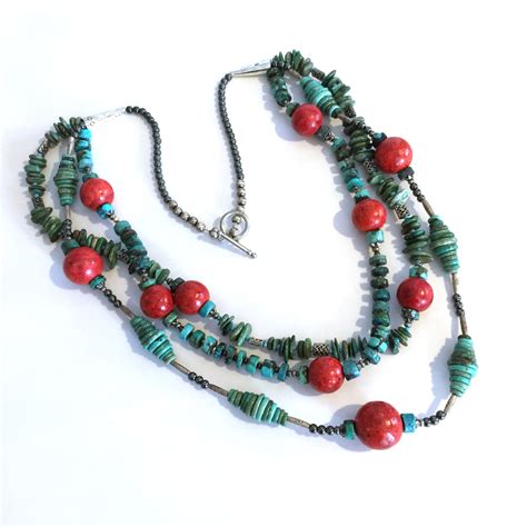 Multi strand turquoise & coral necklace needed re=stringing. It was pretty complicated! Coral ...