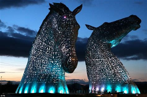 Stunning pictures of The Kelpies show 300-tonne steel horses glowing in the Scottish night sky ...