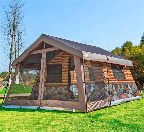 This Log Cabin Tent Has a Giant Screened In Front Porch For a True Luxury Camping Experience