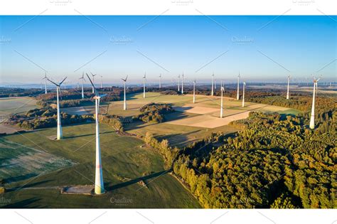 Aerial view of a wind farm in ~ Industrial Photos ~ Creative Market