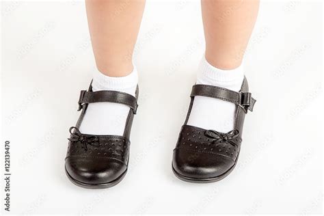 Young School Girl Student Wearing Black Shoes and White Socks Stock Photo | Adobe Stock