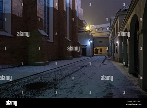 Street in Warsaw old town at night Stock Photo - Alamy