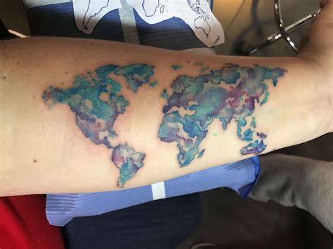 Watercolor World Map Tattoo