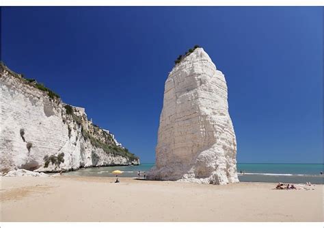 Print of Pizzomunno rock, Castello beach, Vieste, Gargano, Foggia Province, Puglia, Italy ...